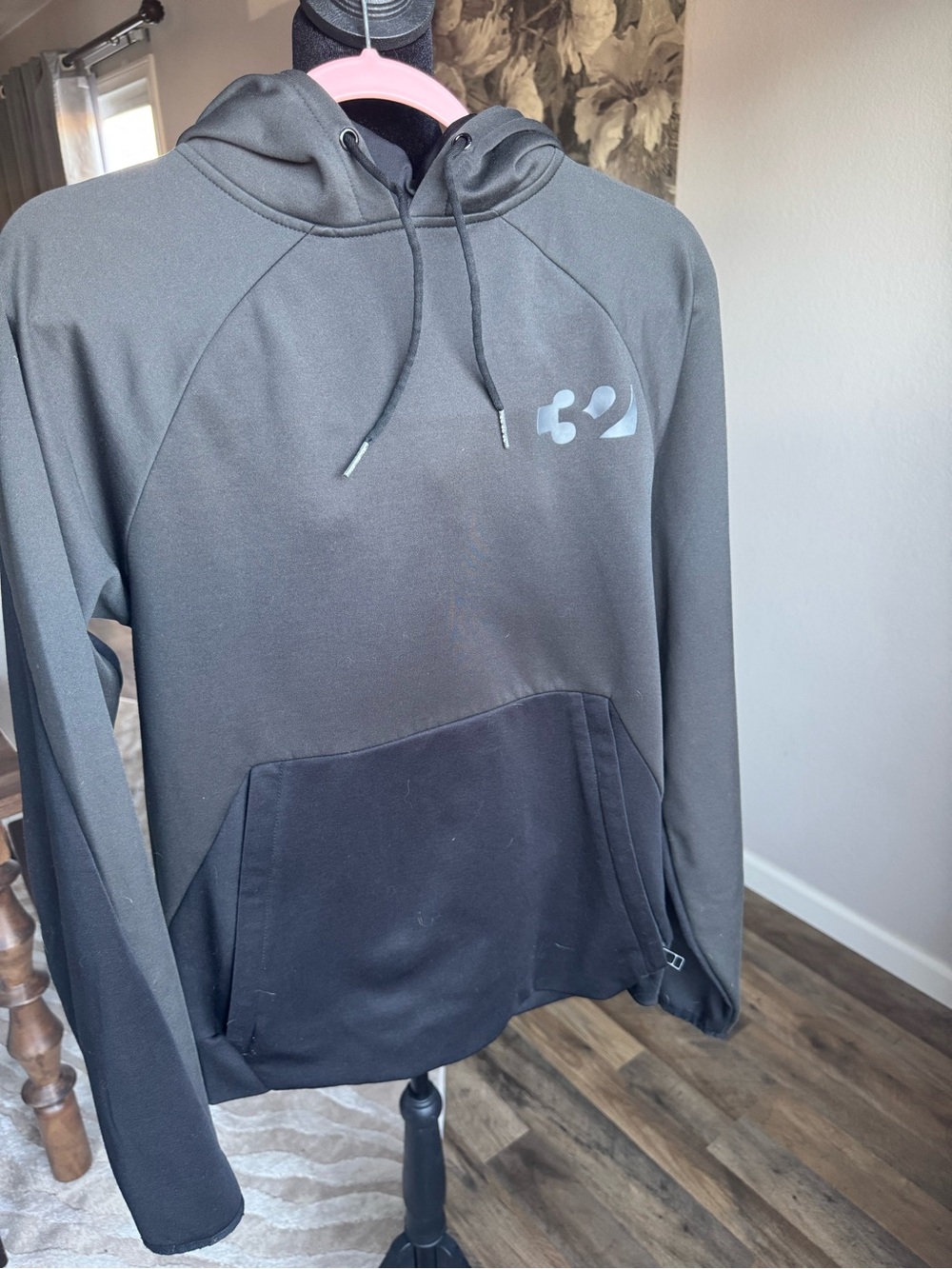 Men's Black Pullover Hoodie with Subtle Chest Logo